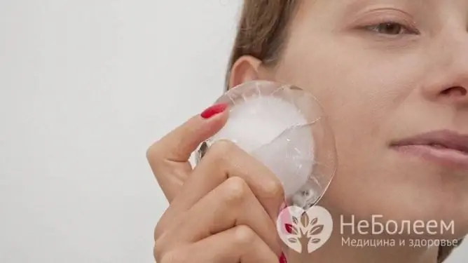 Apply cold to the cheek to reduce swelling