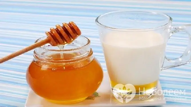 An effective remedy for dry cough - warmed milk with honey